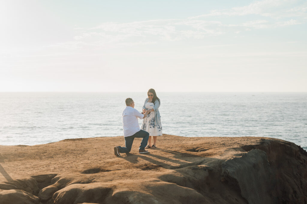 Man proposing at Sunset Cliffs CA