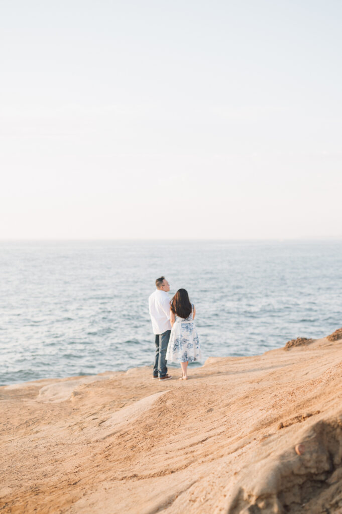 Couple walking at Sunset Cliffs 